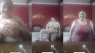 ميلف كبيرة مربربه تتعري وتلعب في بزازها وكسها